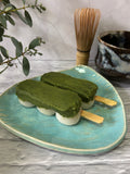Dango mochi topped with Japanese matcha bean paste