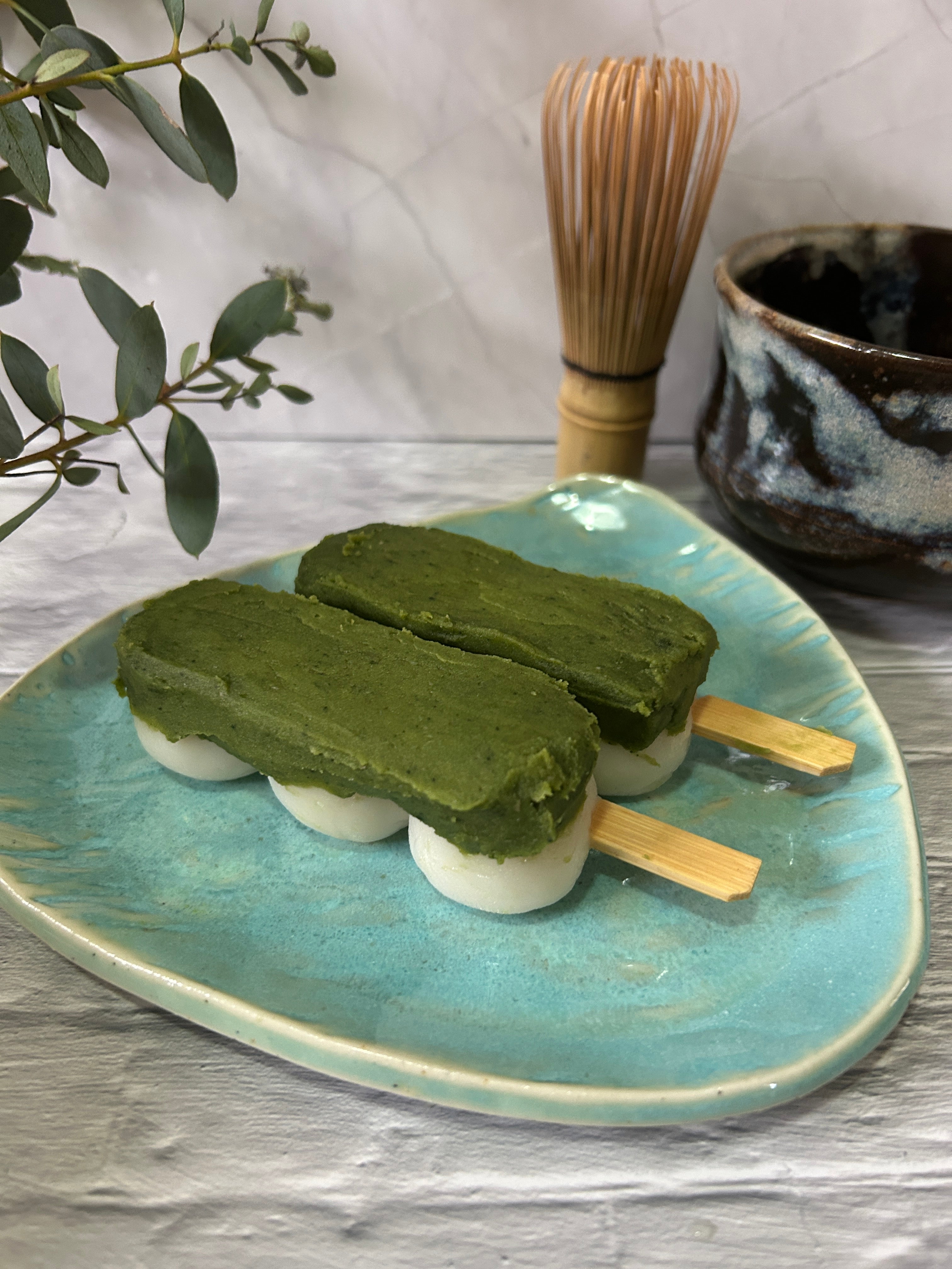 Dango mochi topped with Japanese matcha bean paste