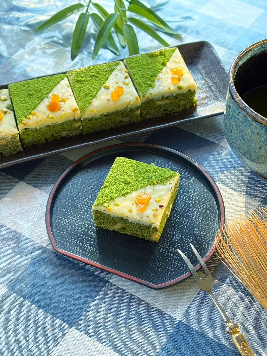 Handmade matcha brownie topped with white chocolate and walnuts