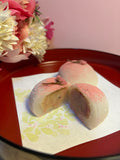Daifuku mochi filled with sakura flavoured smooth white bean paste